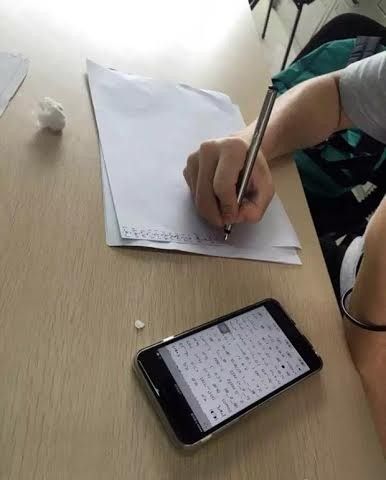 Pic shows: He is copying expressions.nnChinese students who arrive late for class are being asked to copy out 1,000 different emojis on a piece of A4 paper after a university instructor came up with the bizarre and ingenious new punishment.nnPictures of the reportedly "effective" detention activity show the young students struggling to draw the odd faces and expressions required of them.nnCopying out Chinese characters hundreds or even thousands of times has long since been used by teachers in China as punishment for misbehaving students.nnBut one instructor in Chengdu, capital of south-west China¿s Sichuan Province, has taken it to the next level.nnInstead of asking her late-arriving students to write the same words over and over again, University of Electronic Science and Technology instructor Gu Huanmei¿s method has promised to work the students¿ brains to the core.nnEach student sent to detention for lateness is given a "handbook" which includes 1,000 different facial emotions ¿ emojis ¿ in caricature form.nnThe students must copy each emoji exactly as it appears in the handbook ¿ and they are not allowed to make mistakes.nnThis, according to Gu, is to prevent students from slacking during detention, forcing them to concentrate with every stroke of their pen or pencil while they carry out the punishment.nnOne student named Wang Wei, who was dealt the punishment of 1,000 emojis, was quoted as saying the method was "effective" and "impressive".nn(ends)n