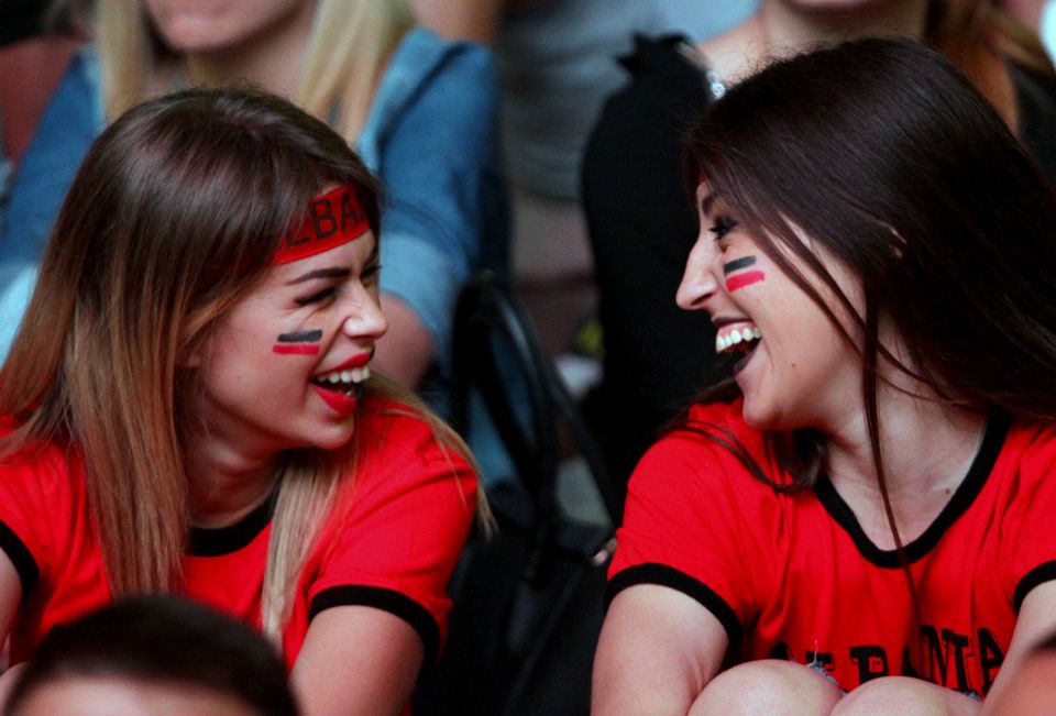 Albanias supporters react as they watch the Euro 2016 football match between France and Albania at the fan zone on Tiranas main boulevard on June 15, 2016. / AFP PHOTO / STRINGERSTRINGER/AFP/Getty Images