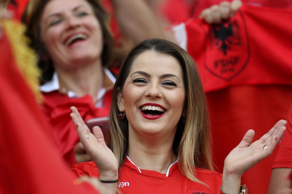 An Albanian fan claps as she waits for the start of the Euro 2016 group A football match between France and Albania at the Velodrome stadium in Marseille on June 15, 2016. / AFP PHOTO / Valery HACHEVALERY HACHE/AFP/Getty Images