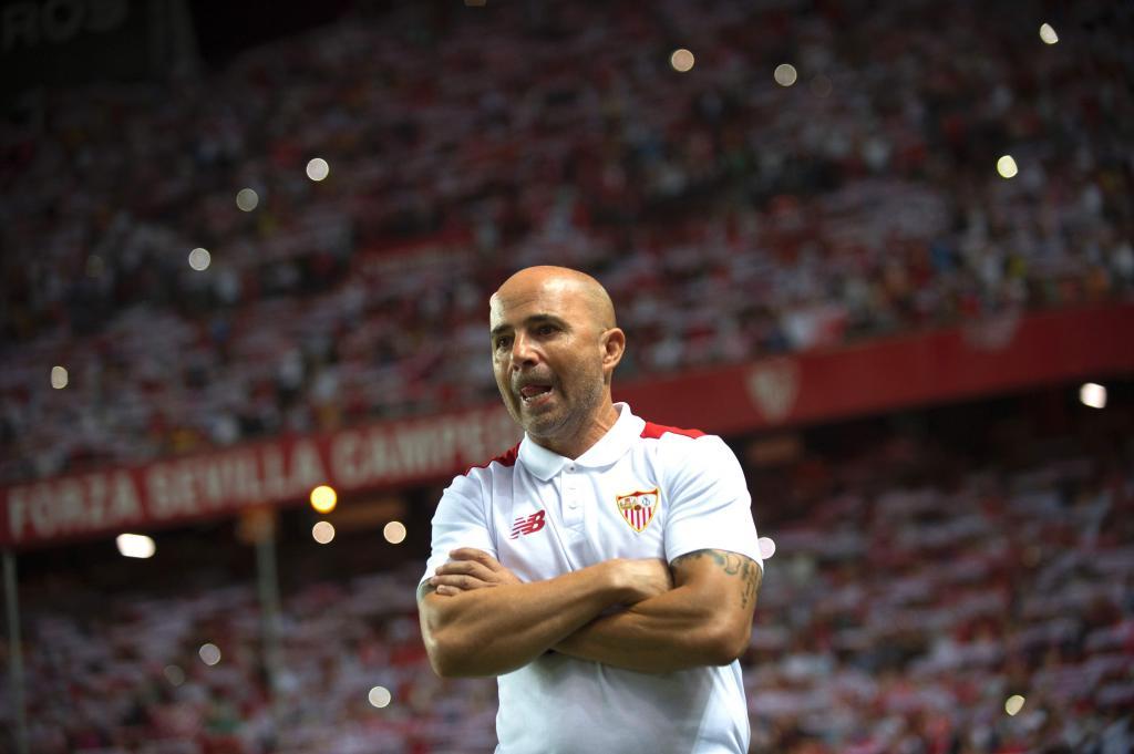 Sevilla's Argentinian head coach Jorge Sampaoli reacts before the first leg of the Spanish Supercup football match between Sevilla FC and FC Barcelona at the Ramon Sanchez Pizjuan stadium in Sevilla on August 14, 2016. / AFP PHOTO / JORGE GUERRERO