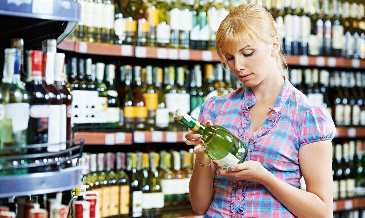 young-woman-buying-alcohol
