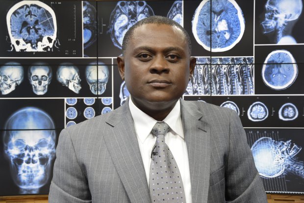 GOOD MORNING AMERICA - Dr. Bennet Omalu, a forensic pathologist whose research linked brain damage to concussions suffered by professional football players, appears on GOOD MORNING AMERICA, 12/14/15, airing on the ABC Television Network. (Photo by Ida Mae Astute/ABC via Getty Images) DR. BENNET OMALU