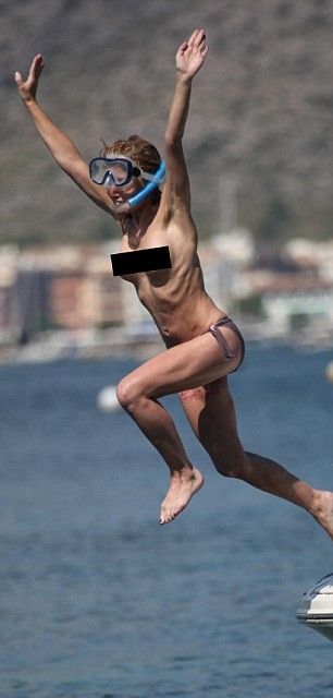 For Paul Ashton.Free to use for Mail online.Recently Married CBeebies star Sarah Jane Honeywell and now husband Ayden Callaghan from Hollyoaks on holiday in Mallorca in 2013.***Boat pics have been seen but Golf course photos have never been put out.***They played on a boat in a cove in Pollensa then we seen at Pollensa Golf Course playing gold before they disappeared into the bushes together.