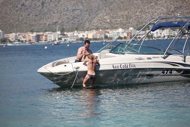 For Paul Ashton.Free to use for Mail online.Recently Married CBeebies star Sarah Jane Honeywell and now husband Ayden Callaghan from Hollyoaks on holiday in Mallorca in 2013.***Boat pics have been seen but Golf course photos have never been put out.***They played on a boat in a cove in Pollensa then we seen at Pollensa Golf Course playing gold before they disappeared into the bushes together.